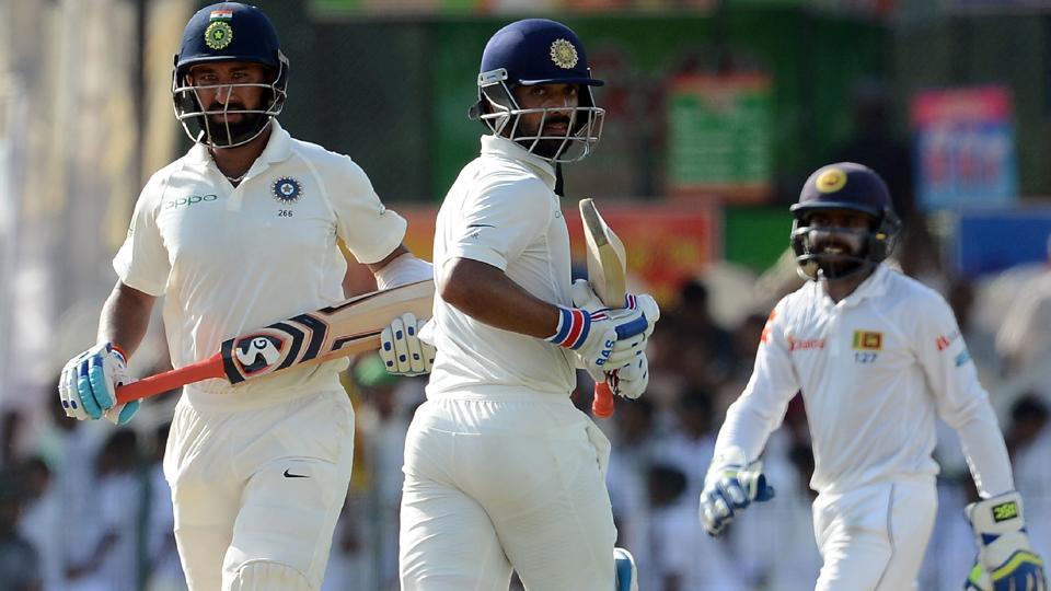 India in driver's seat with Vijay and Pujara ton in second day